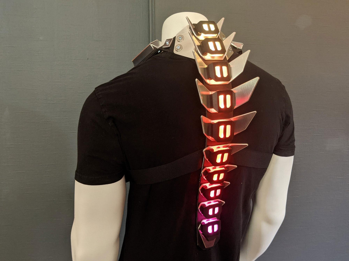 cyberpunk biomechanical armor spine