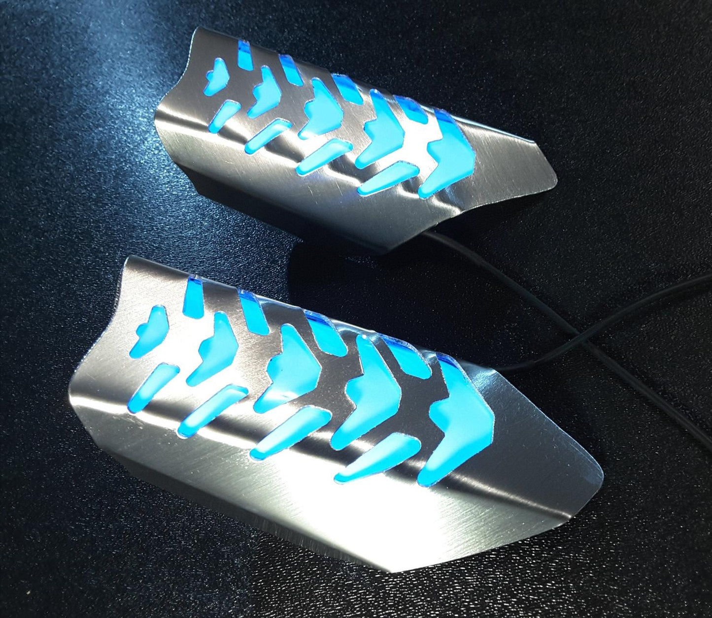glowing metal wrist guard bracer