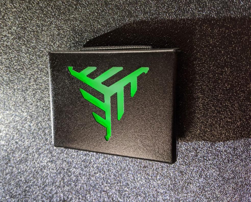 Glowing led metal belt buckle with glowing green doom symbol