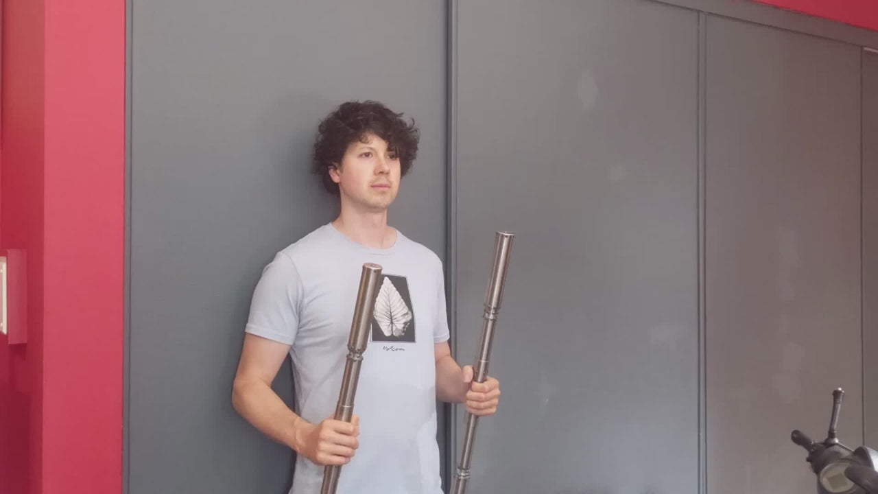 video of telescopic spring loaded titanium bo staff for martial arts