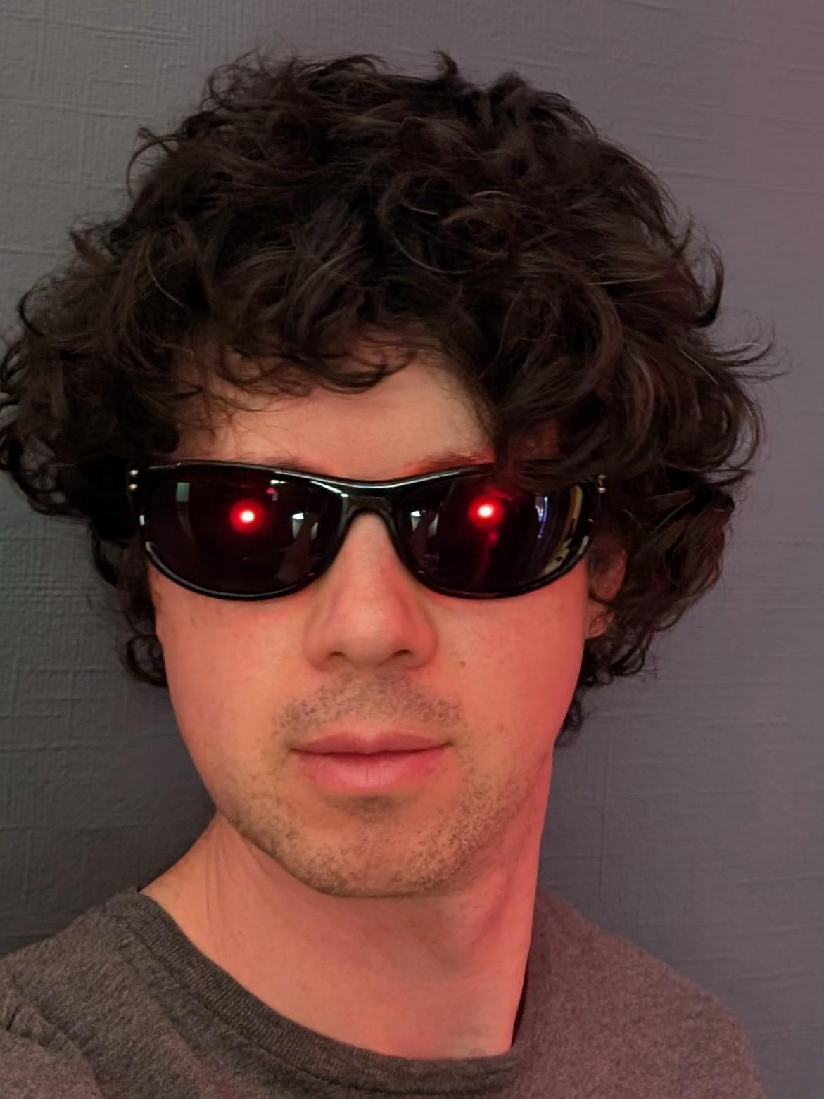 terminator sunglasses with glowing red eyes