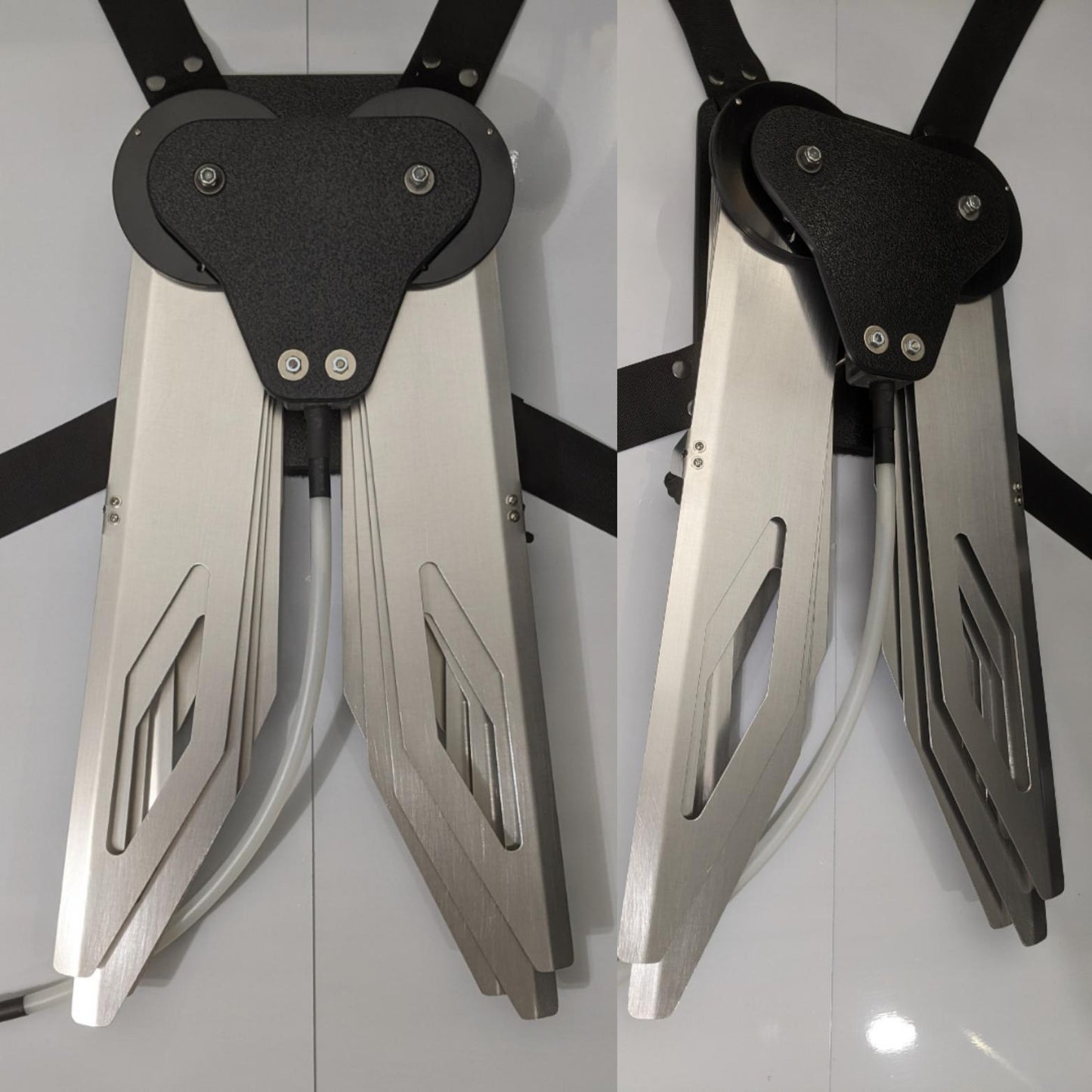 Costume black and silver metal mechanical wings that open and close with a pull cord
