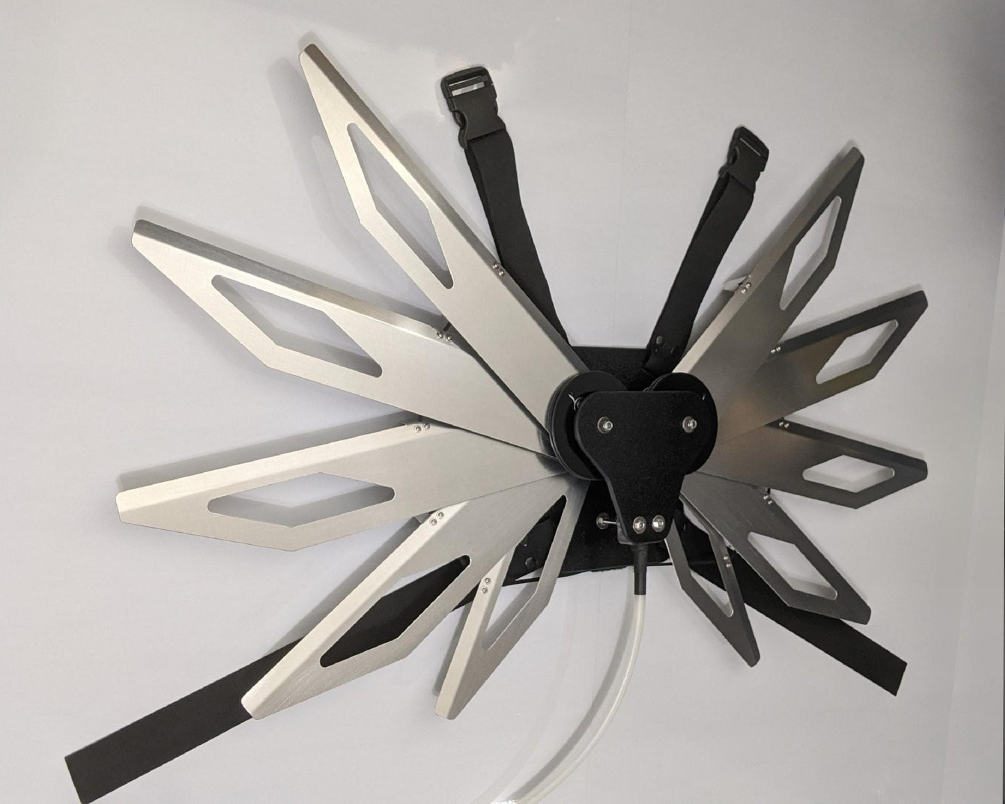 Costume black and silver metal mechanical wings that open and close with a pull cord