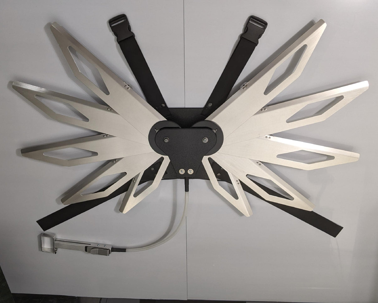 Costume black and silver metal mechanical wings that open and close with a pull cord