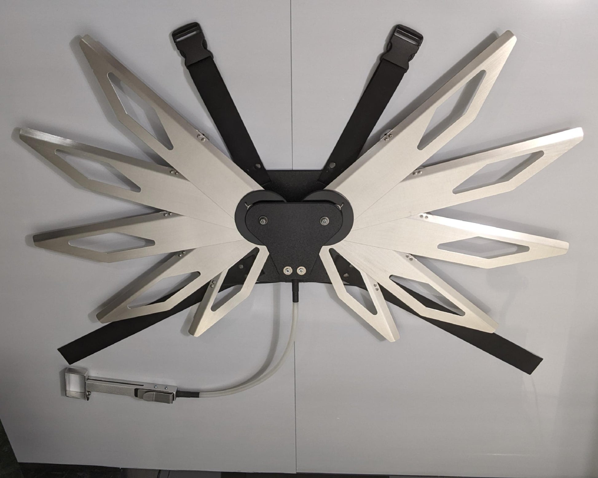 Costume black and silver metal mechanical wings that open and close with a pull cord