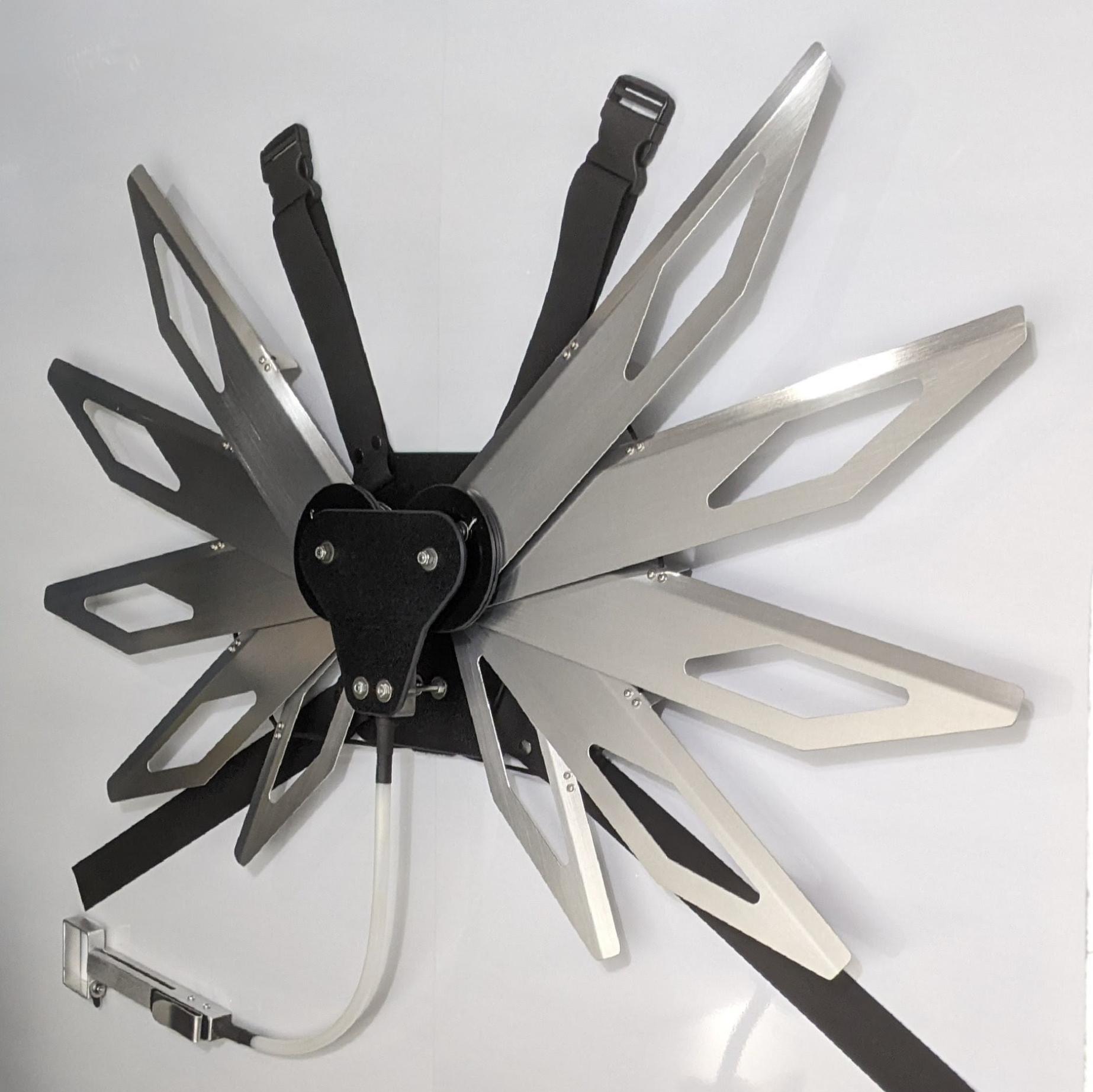 Costume black and silver metal mechanical wings that open and close with a pull cord