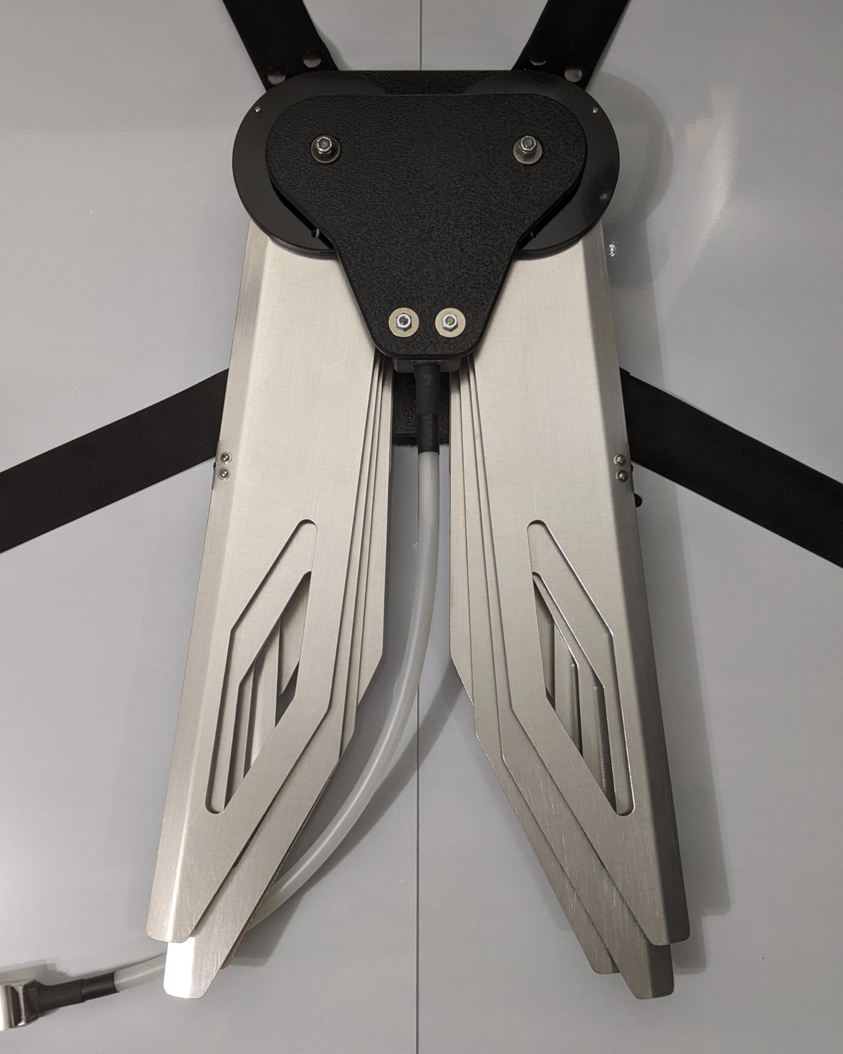 Costume black and silver metal mechanical wings that open and close with a pull cord