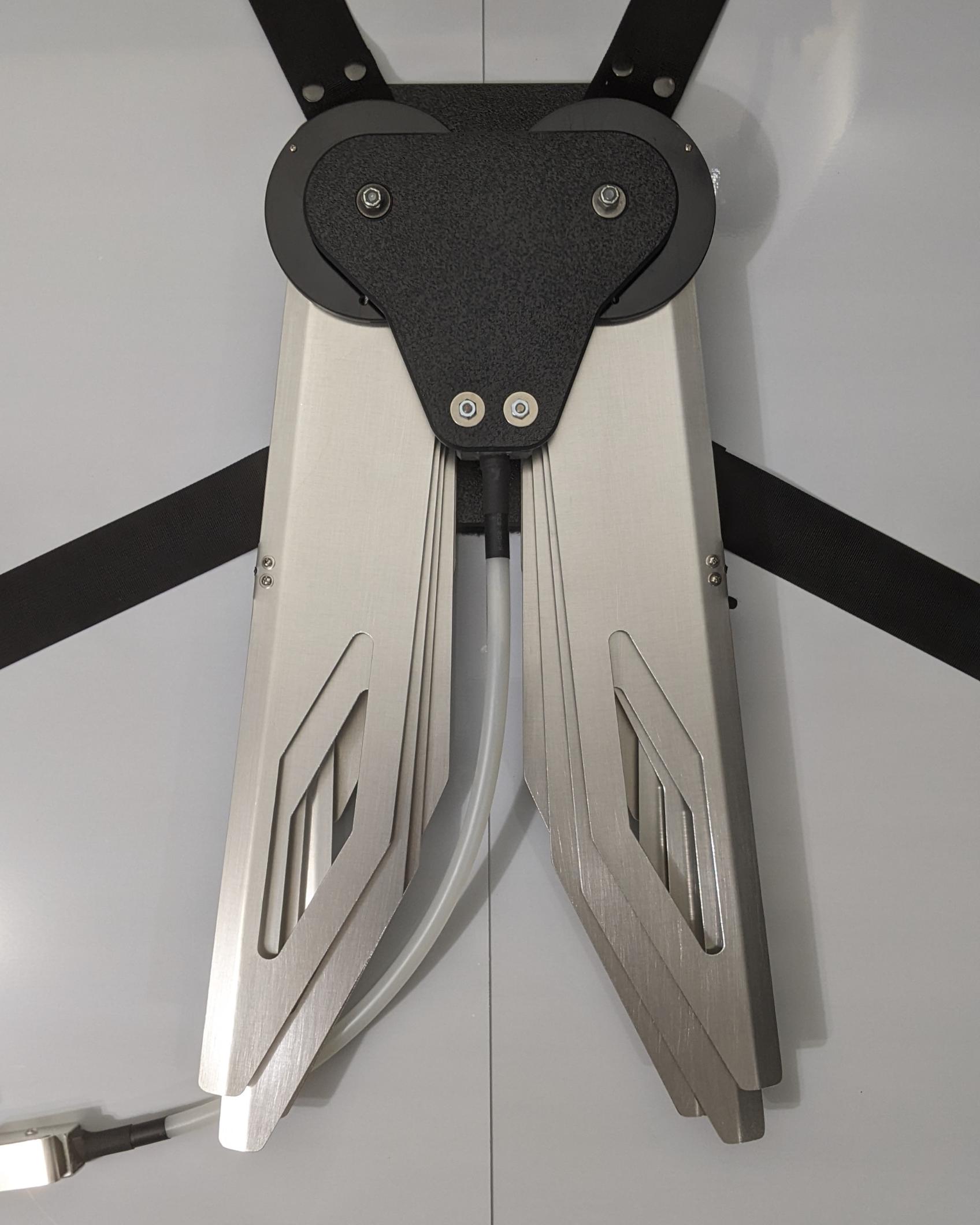 Costume black and silver metal mechanical wings that open and close with a pull cord