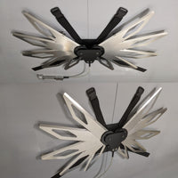 Costume black and silver metal mechanical wings that open and close with a pull cord