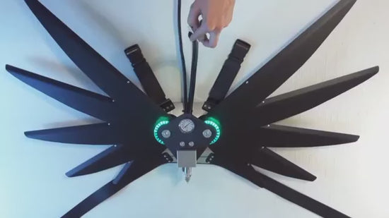 Metal CO2 powered mechanical wings fan out style video opens and closes at the push of a button