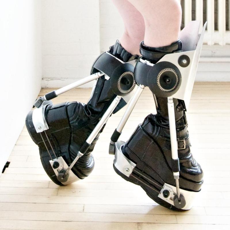 Robotic boots worn by woman picture of lower legs calves