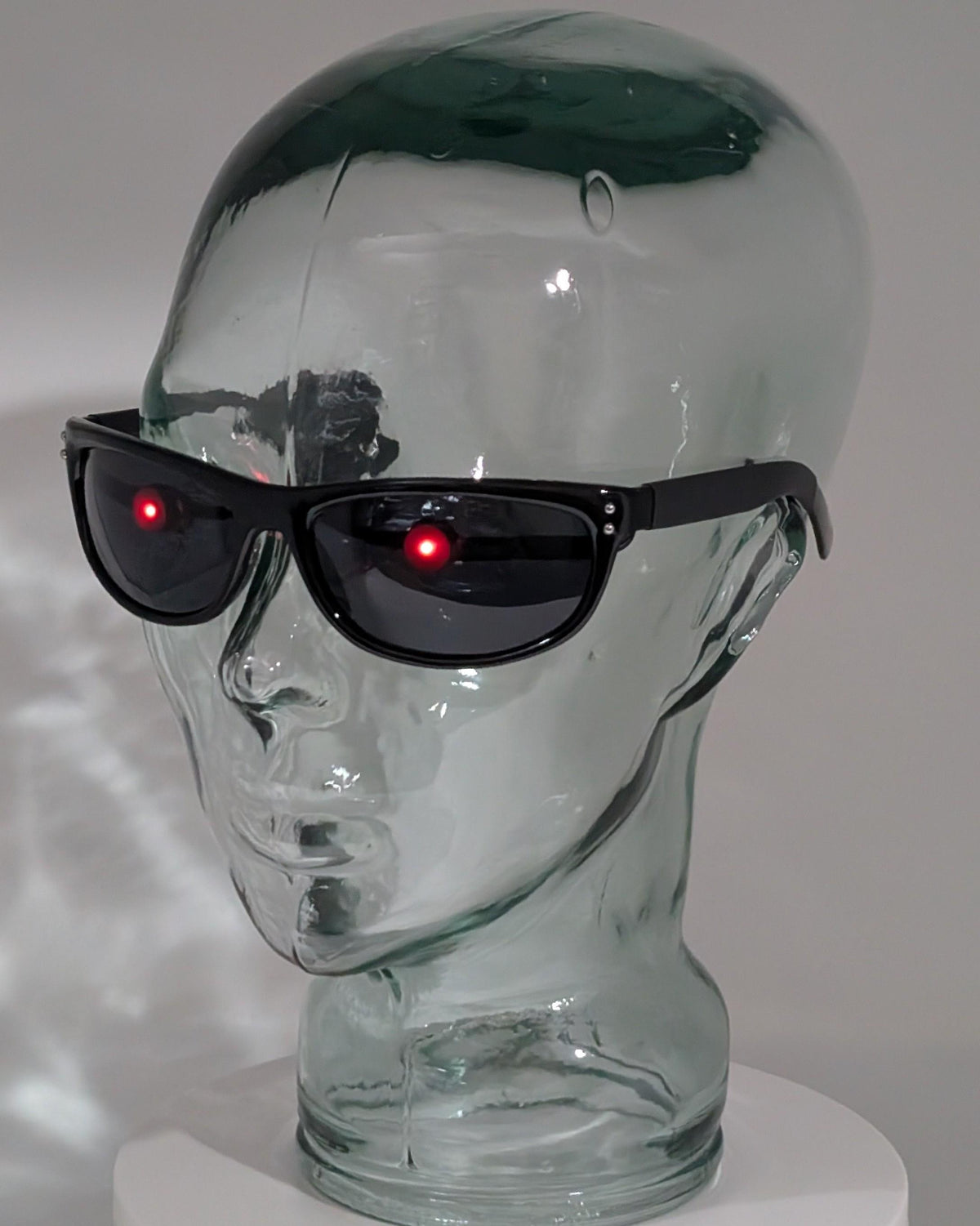 terminator sunglasses with glowing red eyes