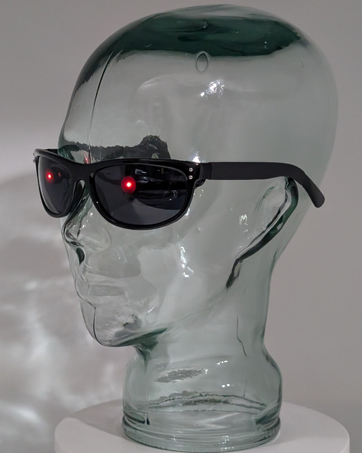 terminator sunglasses with glowing red eyes