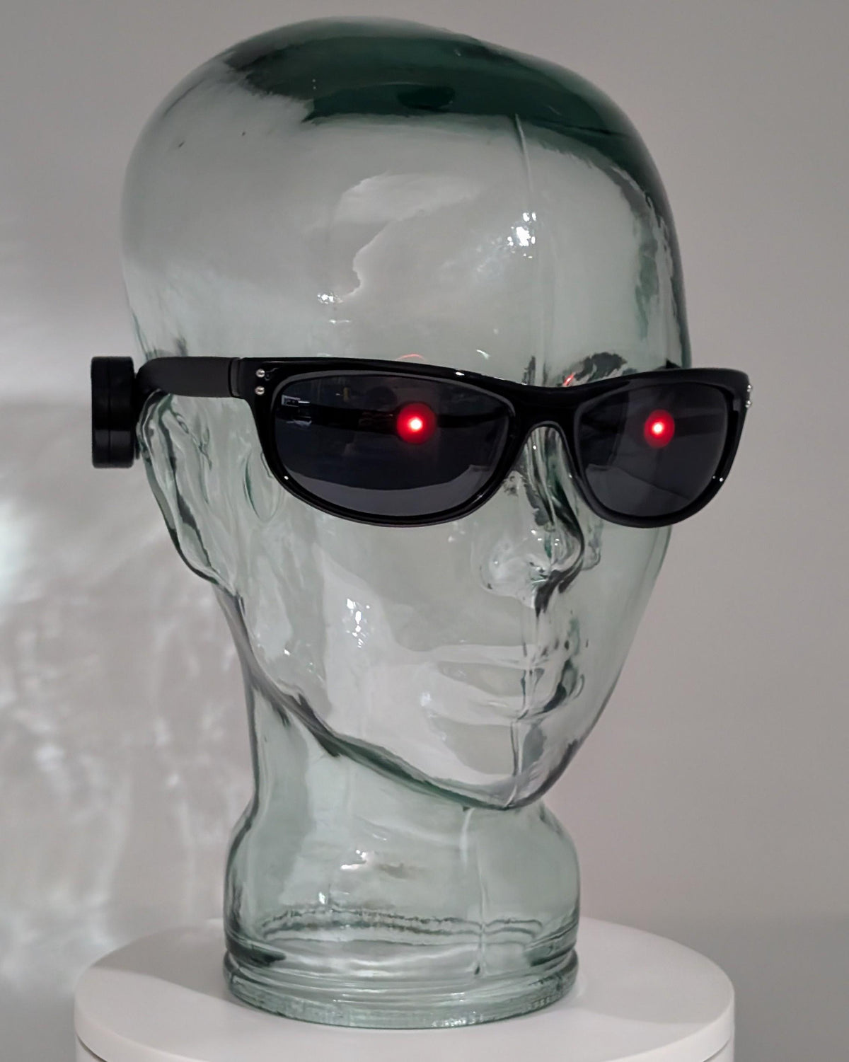 terminator sunglasses with glowing red eyes