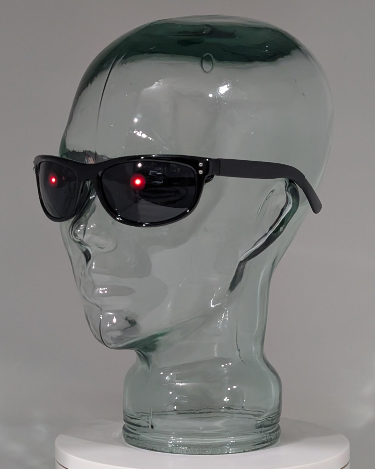 terminator sunglasses with glowing red eyes